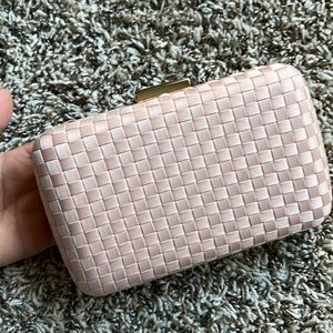 Francesca’s beige nude clutch